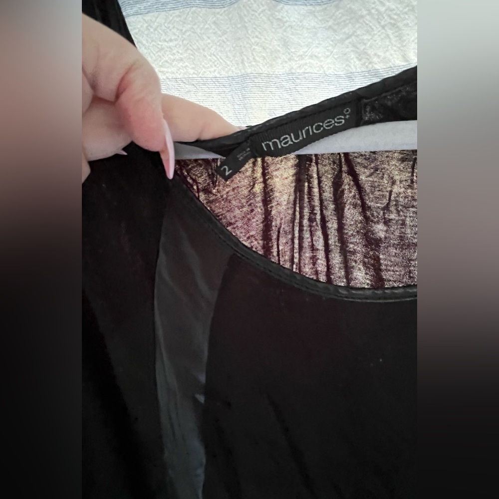Maurice’s black top with faux leather